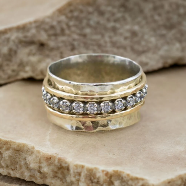 Vintage spinner ring aus gold und silber mit zirkonia